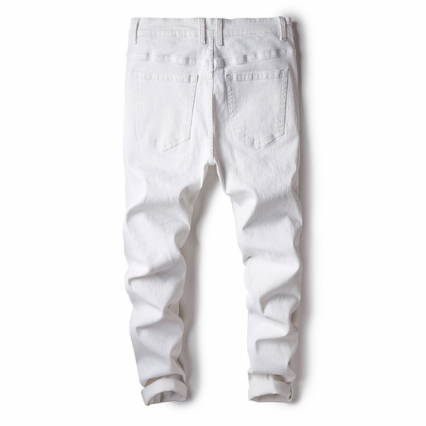 Divatos férfi nadrág fekete-fehér színben, szakadt motívumokkal