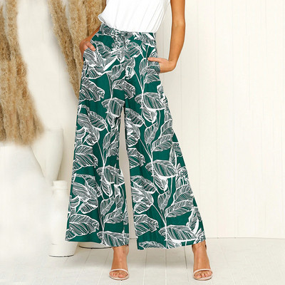 Divatos női széles nadrág magas derékkal és megkötővel