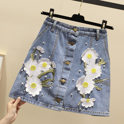 Fusta de damă elegantă din denim cu elemente 3D