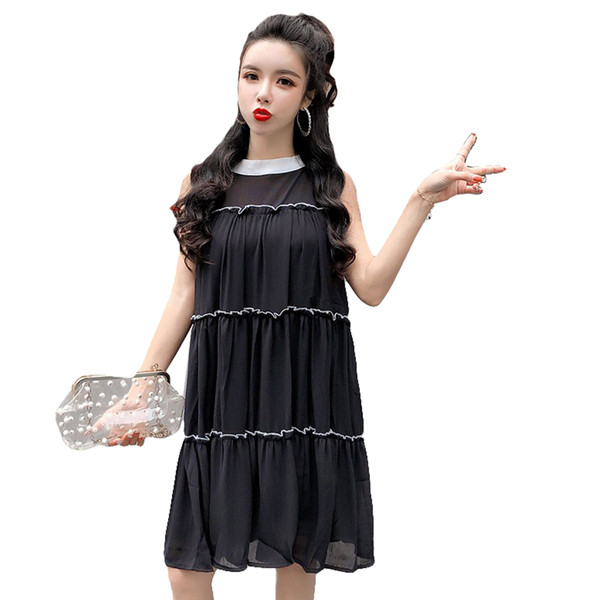 Stílusos női ruha fehér és fekete színben, szalaggal