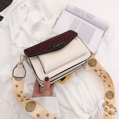 Κομψή γυναικεία τσάντα σε τέσσερα χρώματα από δέρμα με μακριά λαβή