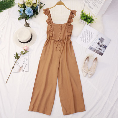 Salopeta de dama eleganta in mai multe culori cu nasturi si cravata