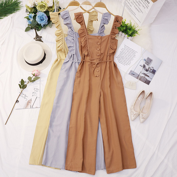 Salopeta de dama eleganta in mai multe culori cu nasturi si cravata