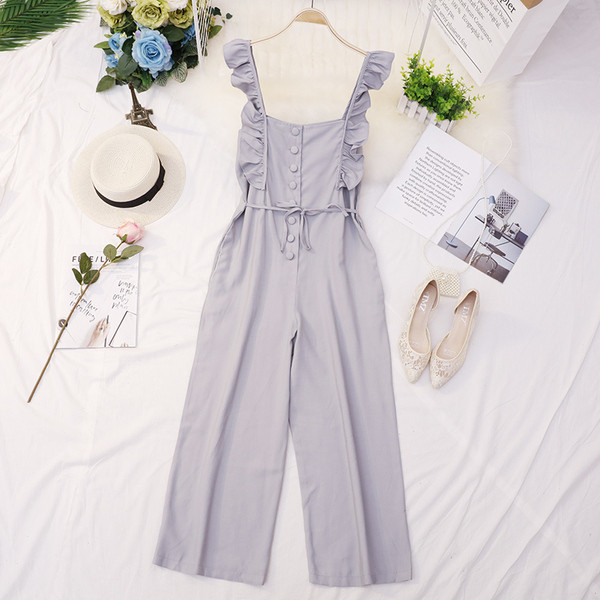 Salopeta de dama eleganta in mai multe culori cu nasturi si cravata