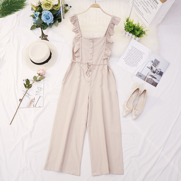 Salopeta de dama eleganta in mai multe culori cu nasturi si cravata