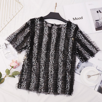 Bluză de damă elegantă în alb și negru cu paiete