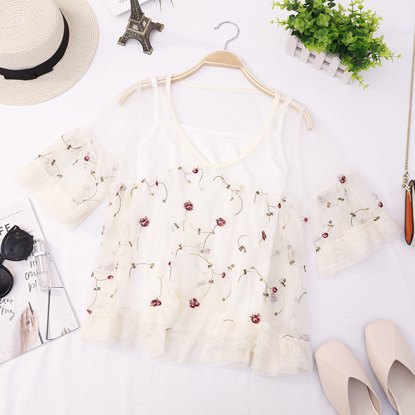 Modern női blúz V-nyakkal, négy színben hímzéssel