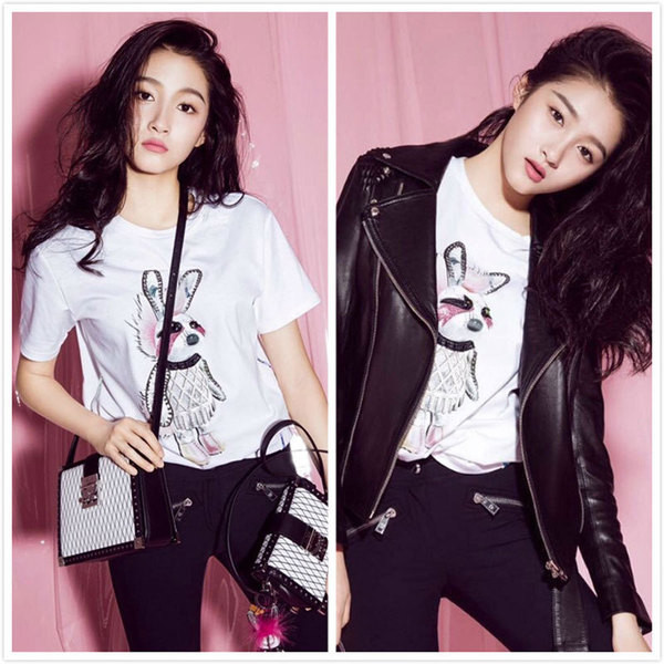 Stílusos női póló fehér színben, rátéttel