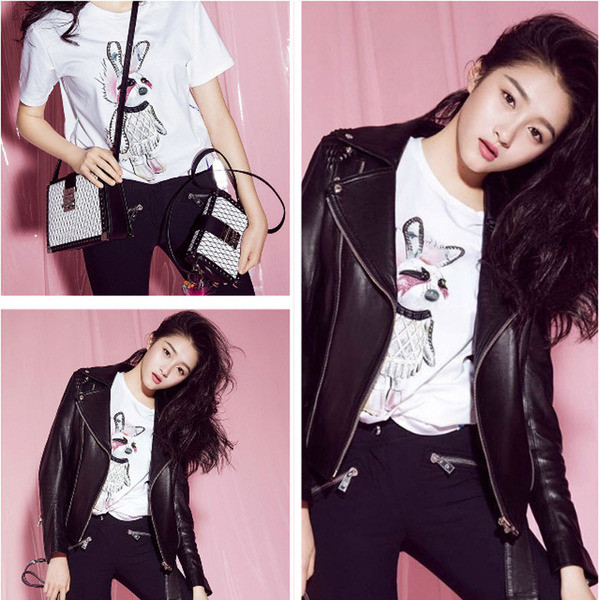 Stílusos női póló fehér színben, rátéttel