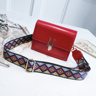 Eko bőrből készült stílusos női táska négy színben, hosszú színes fogantyúval