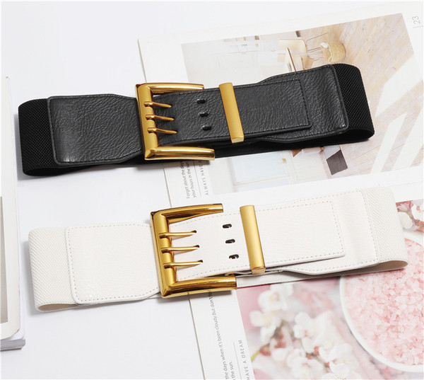 Elasztikus női öv arany csattal fehér, fekete és piros fátyolból