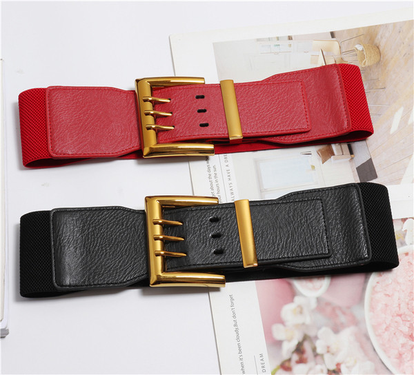 Elasztikus női öv arany csattal fehér, fekete és piros fátyolból