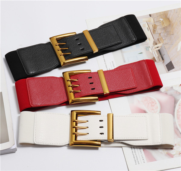 Elasztikus női öv arany csattal fehér, fekete és piros fátyolból