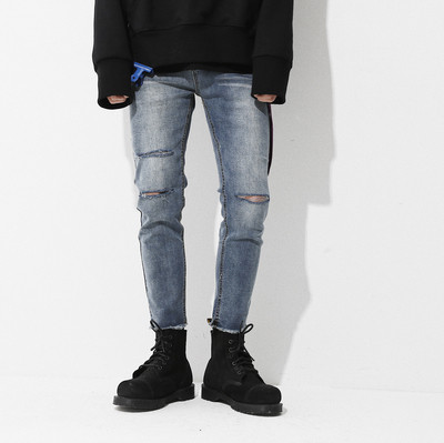 Lezser férfi farmernadrág szakadt motívumokkal