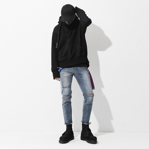 Lezser férfi farmernadrág szakadt motívumokkal