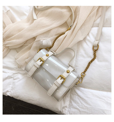 Stílusos női lakkbőr táska három színben, fém elemekkel, rövid és hosszú fogantyúval