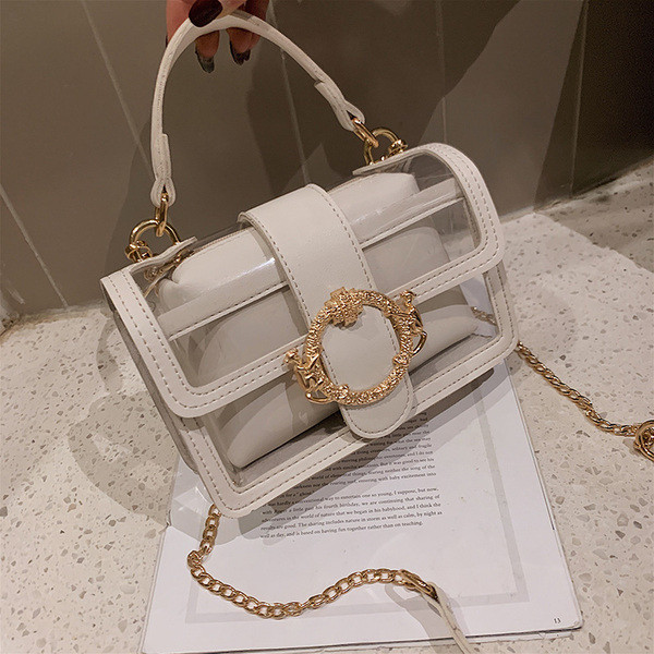 Stílusos női táska öt színben fém díszítéssel, rövid és hosszú füllel