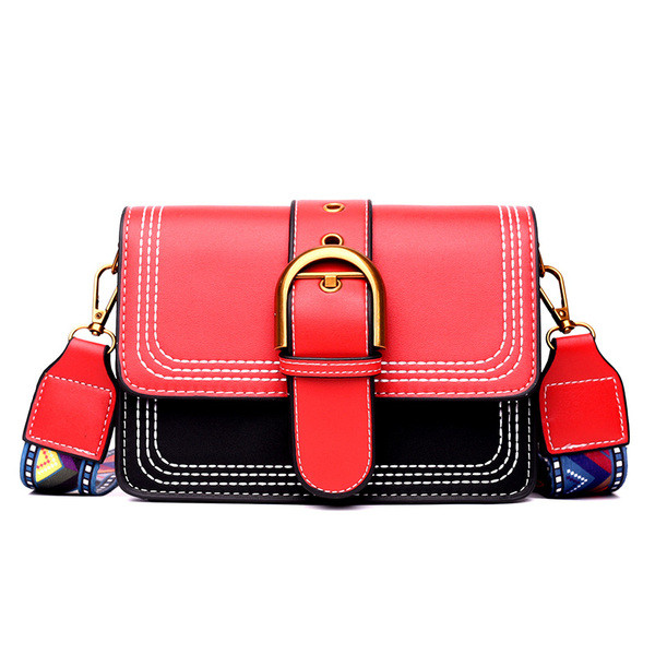 Piele artificială de damă modernă într-o geantă în trei culori cu închizătoare de metal și mâner lung