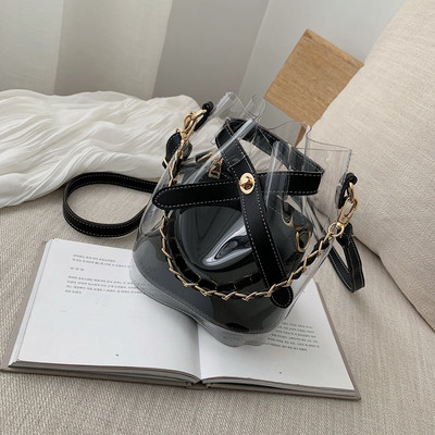 Κομψή γυναικεία τσάντα με διαφανές κάλυμμα σε τέσσερα χρώματα με μεταλλική αλυσίδα