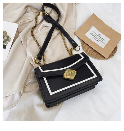 Stílusos női táska három színben fém csattal és hosszú fém fogantyúval