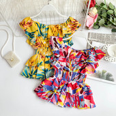 Μοντέρνα γυναικεία μπλούζα σε διάφορα χρώματα με πολύχρωμο πριντ