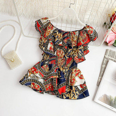 Μοντέρνα γυναικεία μπλούζα σε διάφορα χρώματα με πολύχρωμο πριντ