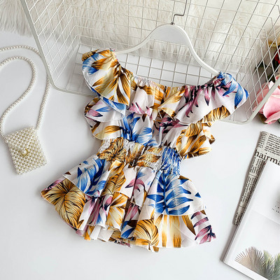 Μοντέρνα γυναικεία μπλούζα σε διάφορα χρώματα με πολύχρωμο πριντ