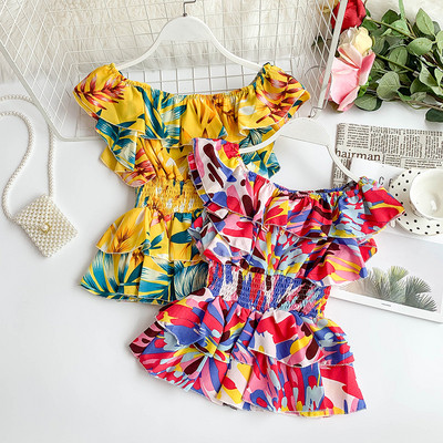 Μοντέρνα γυναικεία μπλούζα σε διάφορα χρώματα με πολύχρωμο πριντ