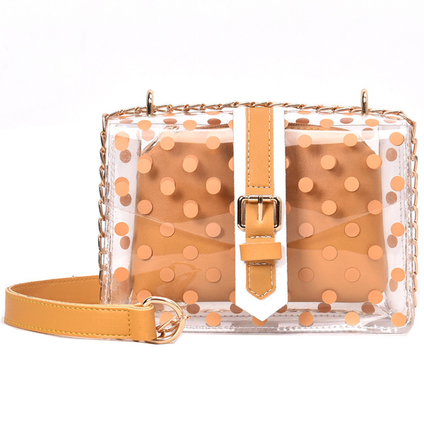 Κομψή γυναικεία τσάντα με διαφανή επικάλυψη και μακρά μεταλλική αλυσίδα