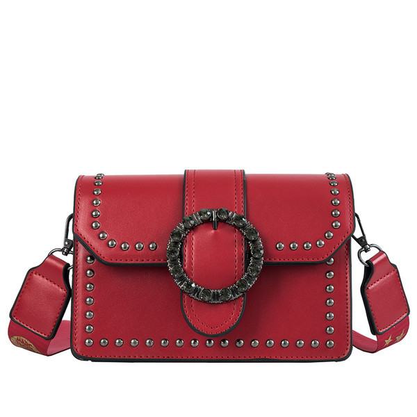 Eko bőrből készült stílusos női táska négy színben fém díszítéssel és hosszú füllel