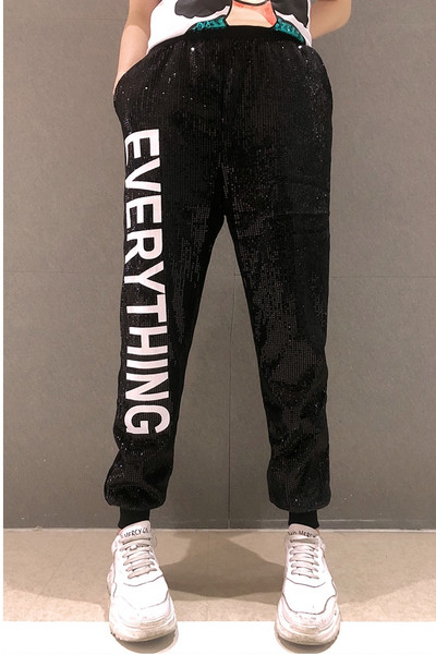 Divatos női nadrág flitterekkel fekete színben, felirattal