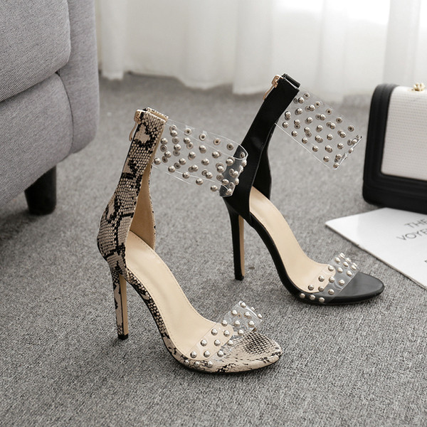 Női szandál új modellje magassarkúval és fém elemekkel, két színben