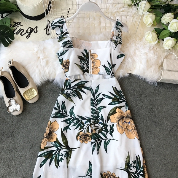 Lezser női hosszú ruha vastag pántokkal és virágmotívummal