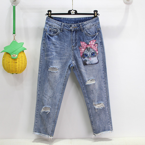 Ημερήσιο γυναικείο σετ -  μπλούζα  + τζιν με εφαρμογή