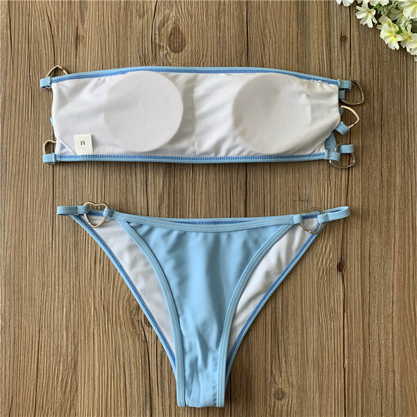 Női fürdőruha kék színben, fém díszítéssel