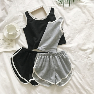 Sports-casual women`s set of two parts in black and gray