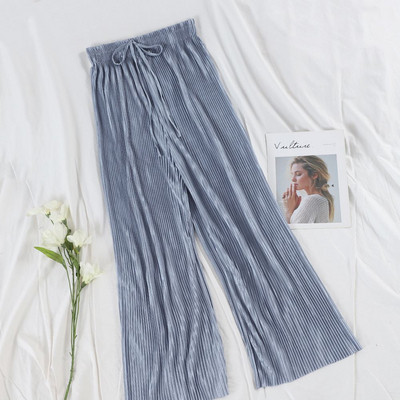 Modern női redős nadrág magas derékkal és nyakkendővel