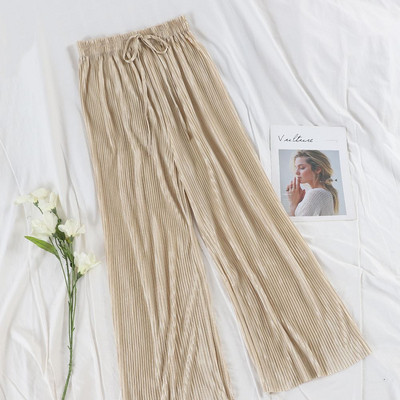 Modern női redős nadrág magas derékkal és nyakkendővel