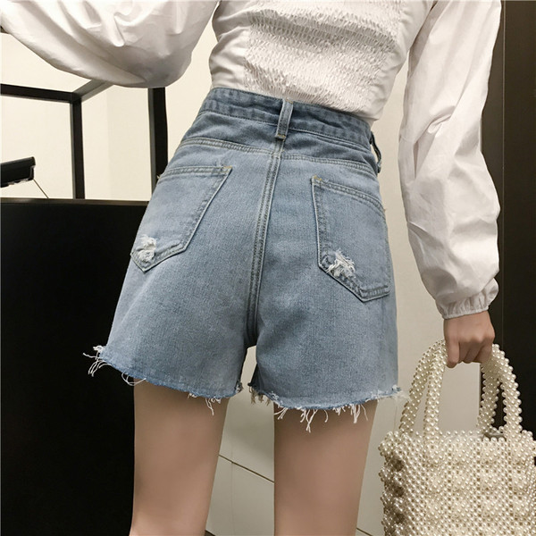 Pantaloni scurți din denim de damă în negru și albastru