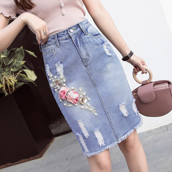 Modern női farmerszoknya 3D elemekkel