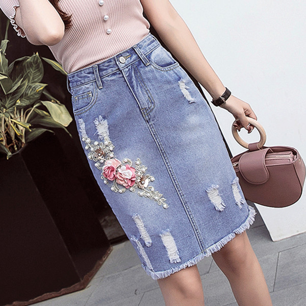 Modern női farmerszoknya 3D elemekkel