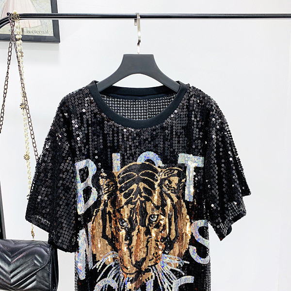 Modern női blúz fekete és ezüst flitterekkel