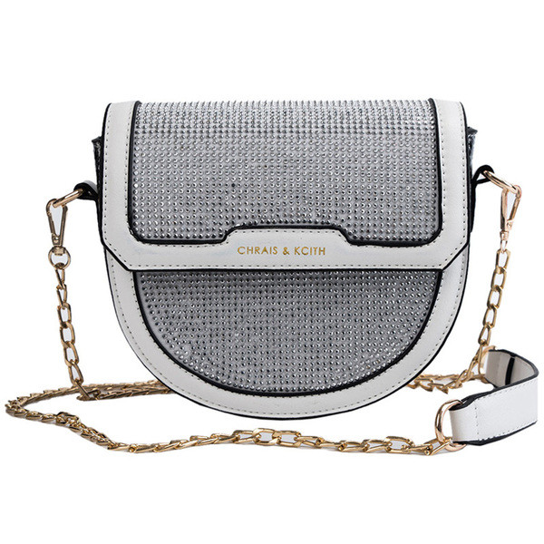 Σύγχρονη γυναικεία τσάντα  σε τρία χρώματα με λαμπερά στοιχεία και μεγάλη λαβή από μέταλλο