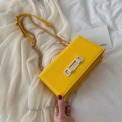 Eko bőrből készült stílusos női táska öt színben fém rögzítéssel és hosszú fémlánccal