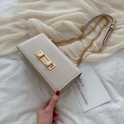 Eko bőrből készült stílusos női táska öt színben fém rögzítéssel és hosszú fémlánccal