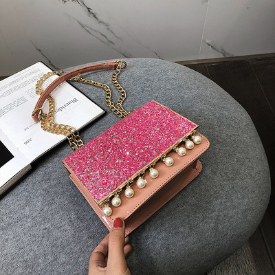 Κομψή γυναικεία τσάντα σε τέσσερα χρώματα με λαμπερά στοιχεία και διακοσμητικά μαργαριτάρια