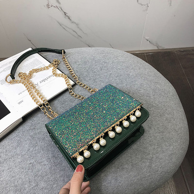 Κομψή γυναικεία τσάντα σε τέσσερα χρώματα με λαμπερά στοιχεία και διακοσμητικά μαργαριτάρια