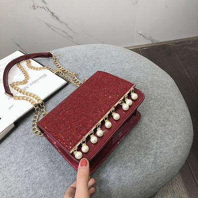 Κομψή γυναικεία τσάντα σε τέσσερα χρώματα με λαμπερά στοιχεία και διακοσμητικά μαργαριτάρια