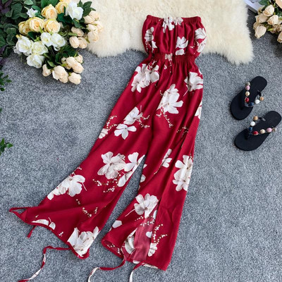 Salopetă lungă de damă cu motiv floral în negru și roșu