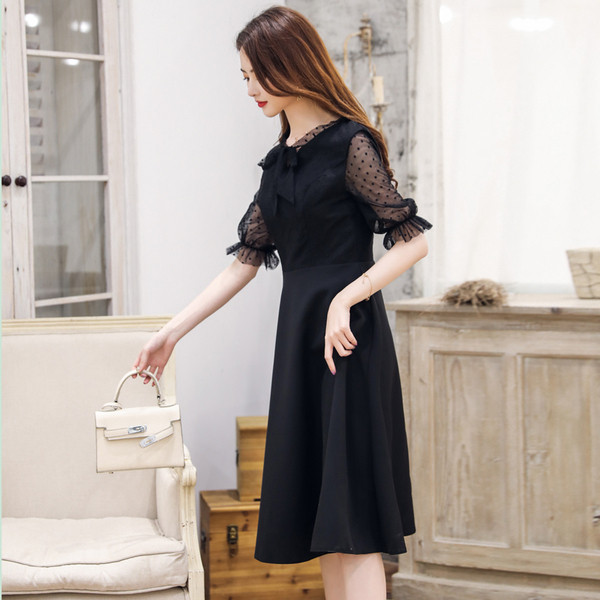 Stílusos női ruha O-nyakú fekete színben